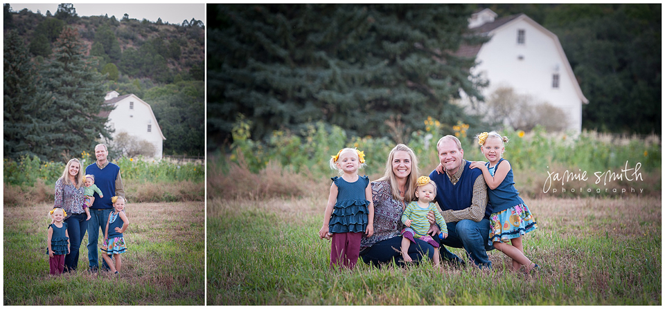 family portraits in front of white barn