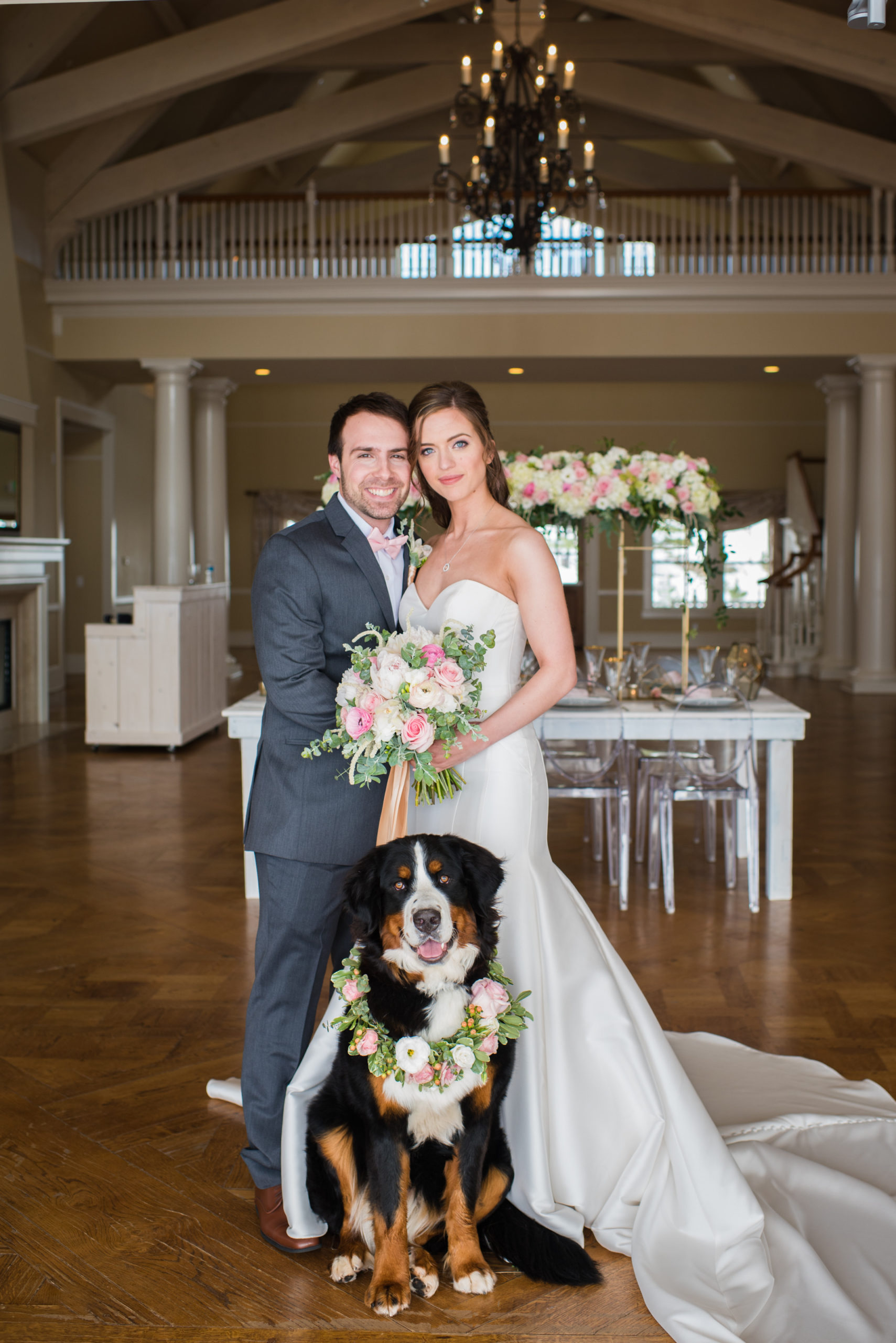 bride and groom smiling with their dog at Flying Horse Ranch Wedding venue