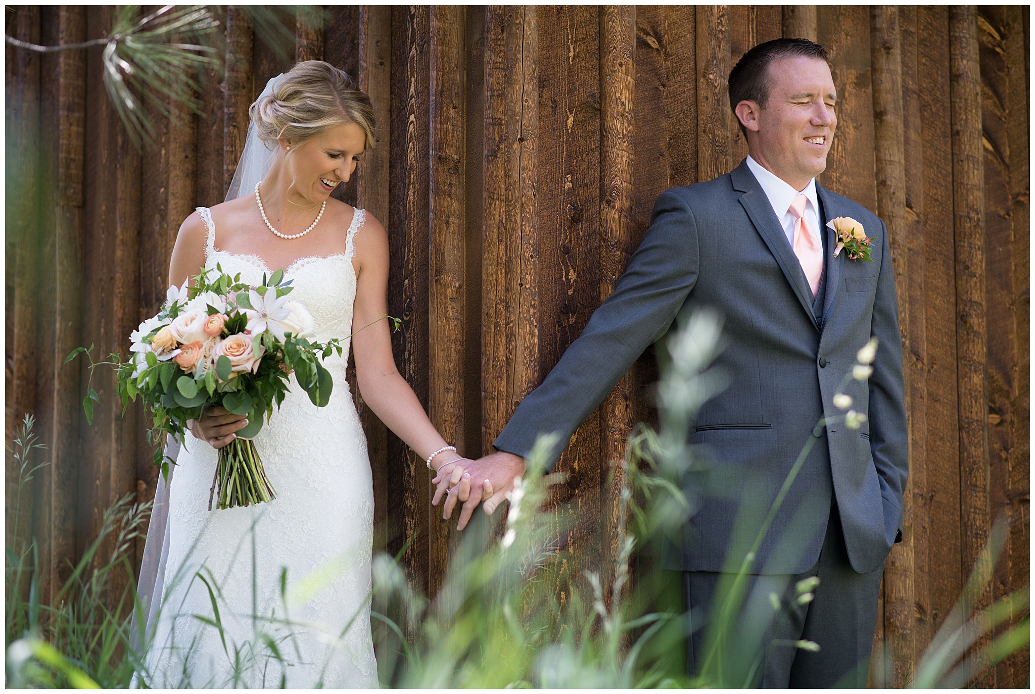 bride and groom first touch at Spruce Mountain Ranch Wedding venue