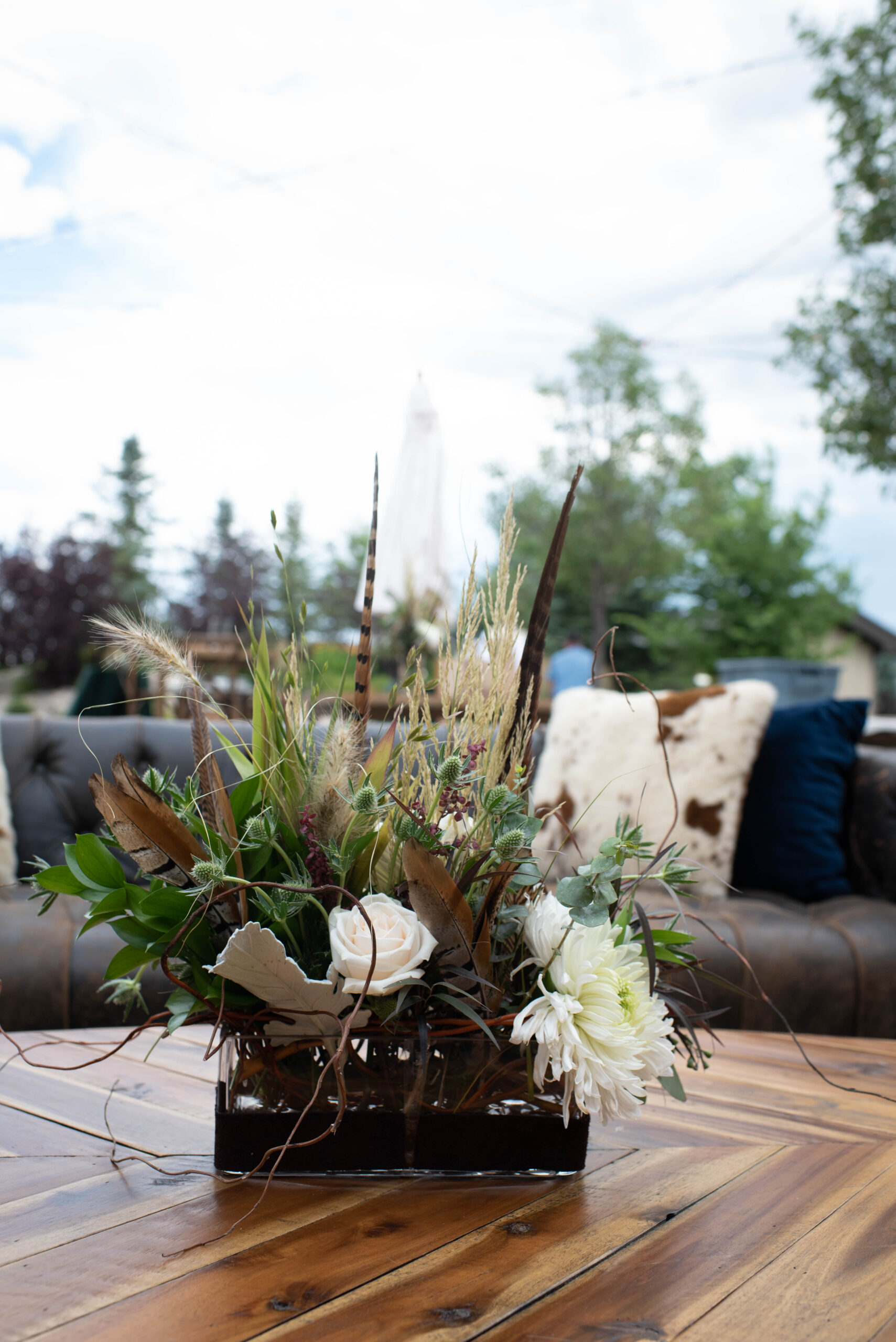 Details of a coffee table centerpiece for a cocktail hour outdoors